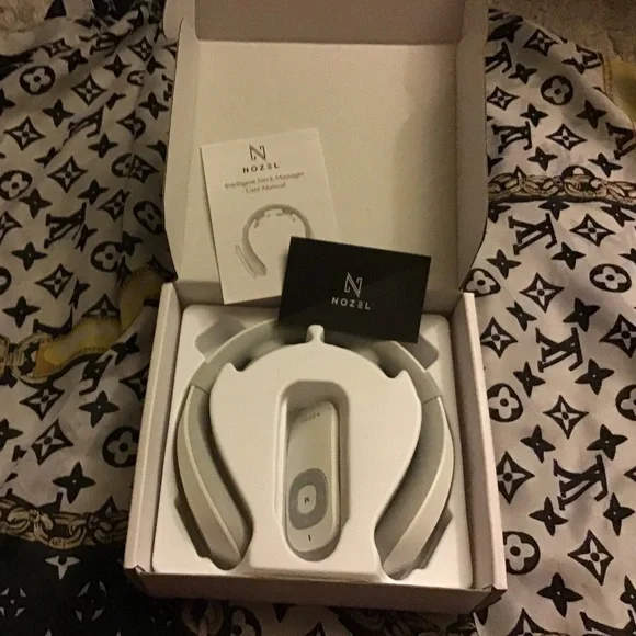 New still in box NOZEL INTELLIGENT NECK MASSAGER